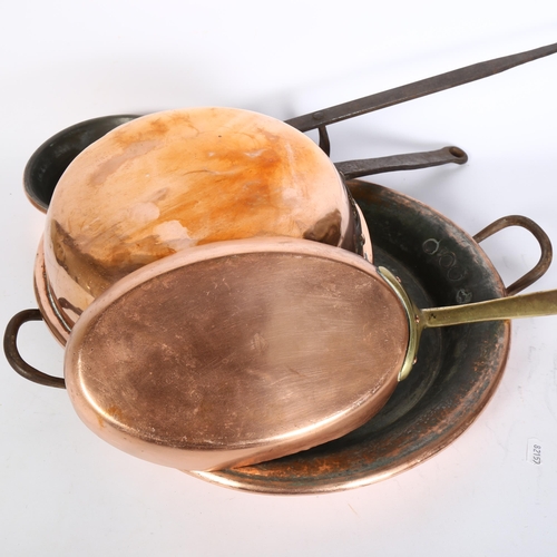 449 - A large oval French copper 2-handled pan, diameter 38cm, a large copper frying pan with iron handle,... 