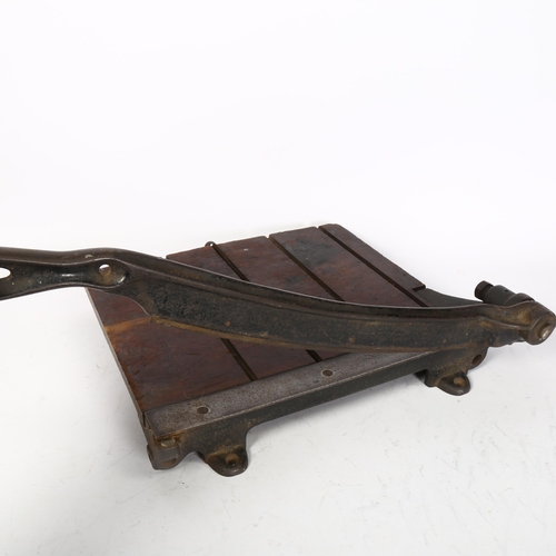 464 - A Vintage iron-mounted wooden guillotine, no maker's stamp, length of guillotine handle 55cm