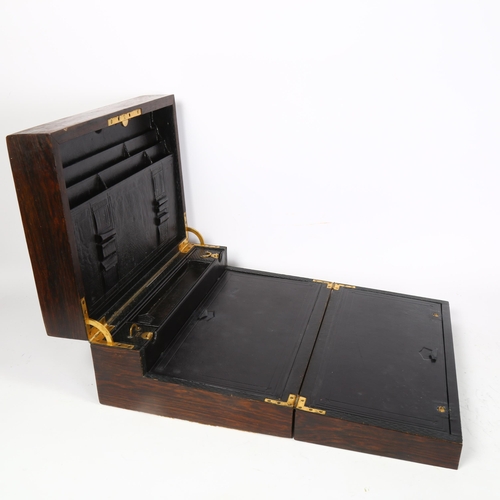 472 - A Victorian rosewood fold-out travelling writing slope or companion, including fitted leather interi... 