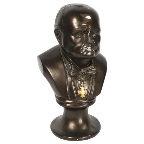 473 - A plaster bust and stand sculpture of Sir Winston Churchill, height 31cm