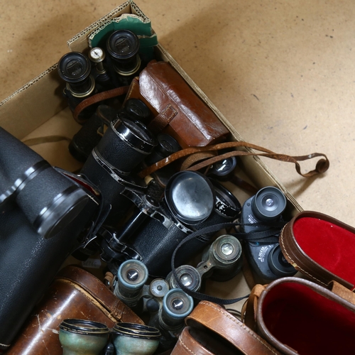 487 - A quantity of Vintage binoculars and associated cases, mostly in A/F condition, some maker's labels ... 