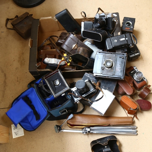 489 - A quantity of Vintage cameras, equipment and accessories, including a Praktica BX20, an Ensign all-d... 