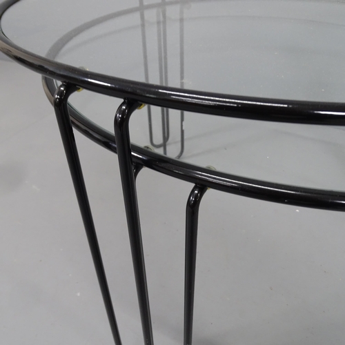 2275 - A set of two 1980s Belgian nesting coffee tables with glass top and metal frame. Largest 62x41cm