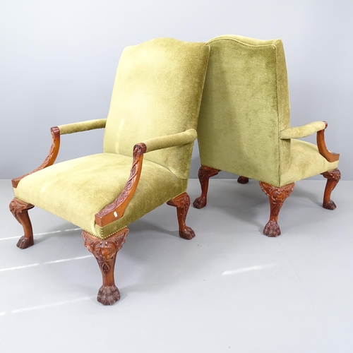 2196 - A pair of walnut and upholstered Gainsborough style open armchairs, on cabriole legs with carved dec... 