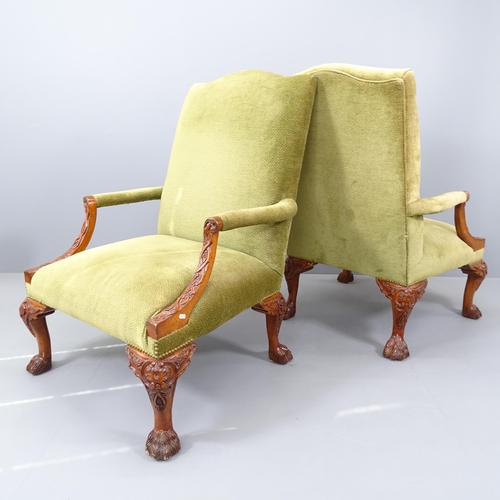 2197 - A pair of walnut and upholstered Gainsborough style open armchairs, on cabriole legs with carved dec... 