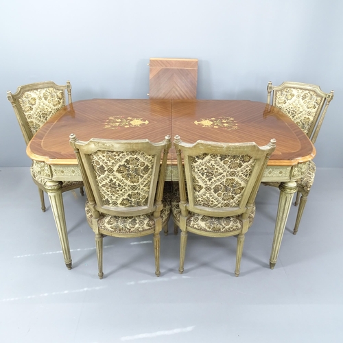 2198 - An ornate French walnut and kingwood dining table, with inlaid floral decoration on carved and paint... 