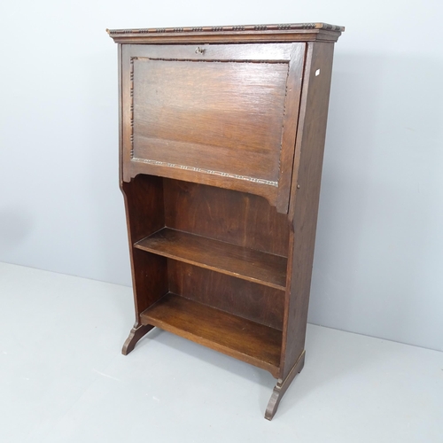 2199 - An early 20th century oak student's bureau. 67x112x30cm