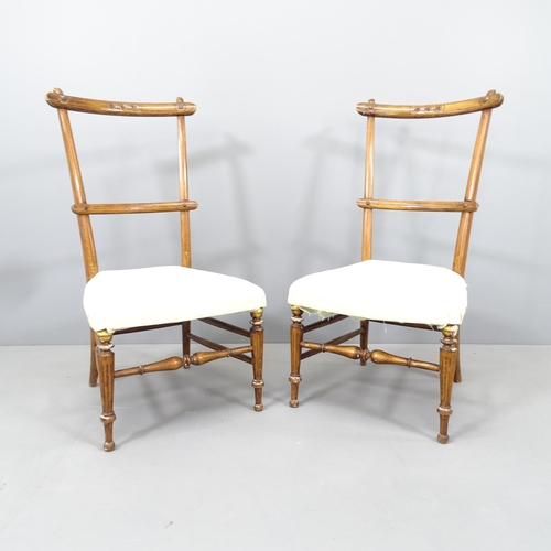 2200 - A pair of Arts & Crafts mahogany and upholstered salon chairs.