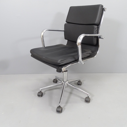 2214 - A contemporary leather upholstered swivel office chair on chrome base.