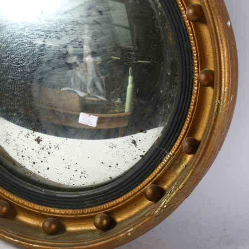 366 - A Victorian giltwood and gesso convex wall mirror, with ball decoration, diameter 43cm