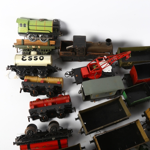 39 - A quantity of Hornby tinplate O gauge commercial goods wagons, locomotives and tender, including var... 