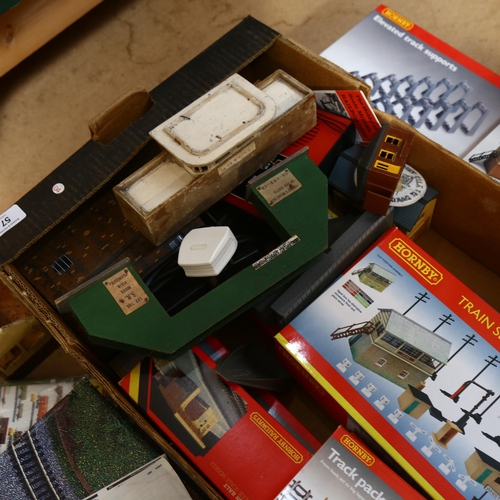 57 - HORNBY - a quantity of boxed Hornby train set accessories, including various track accessories, buil... 
