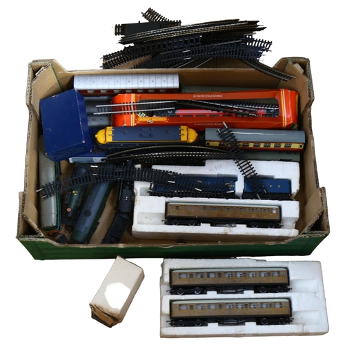 58 - A quantity of Hornby, Hornby Dublo, Tri-ang and other loose coaches, train track and other accessori... 