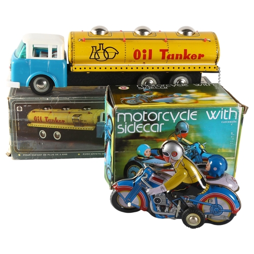 69 - A tin litho friction oil tanker truck, in original box, probably 1960s, and a tinplate motorcycle wi... 