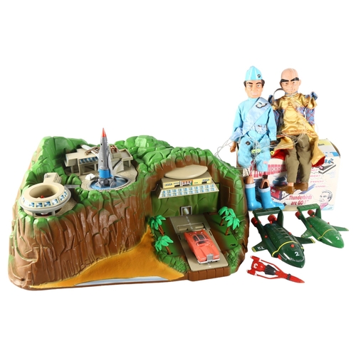 71 - THUNDERBIRDS - a Carlton Tracy Island part play set, 2 Thunderbird puppets, and a Wesco Thunderbirds... 