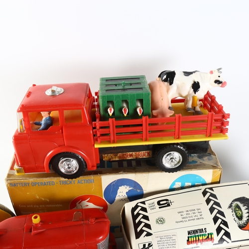 72 - LOUIS MARX - a Vintage battery operated reversible farm tractor, unboxed, a Marx farm truck, complet... 