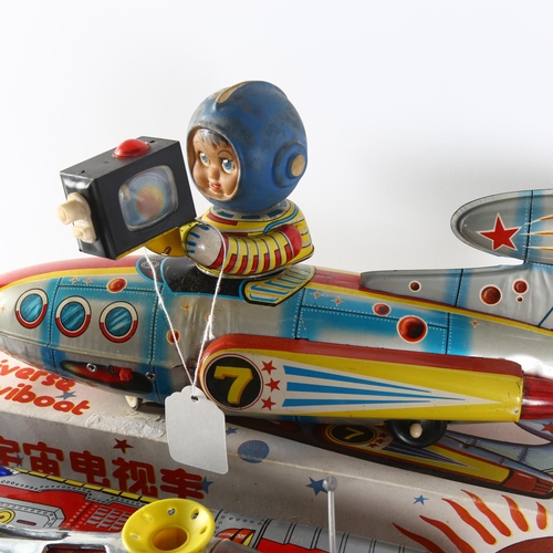 79 - An ME777 Universe Televiboat tinplate battery operated rocket ship, in original box, a second batter... 