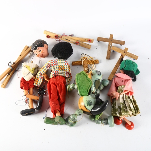 83 - PELHAM PUPPETS - a group of 4 Pelham Puppets, loose without boxes, including Pinocchio, a baby drago... 