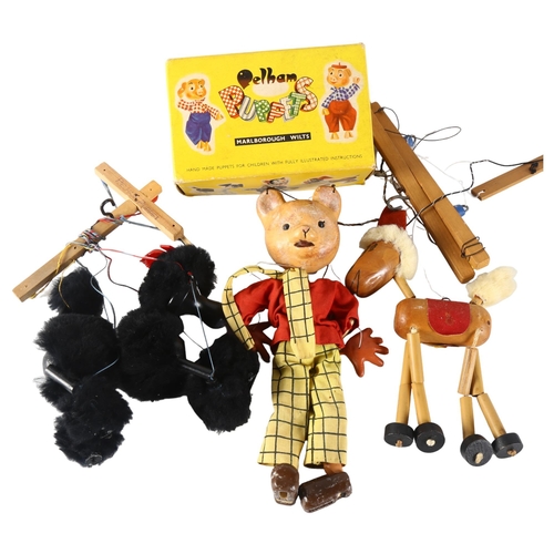 88 - PELHAM PUPPETS - a group of 3 Pelham Puppets, to included an unboxed Rupert The Bear, a boxed Poodle... 