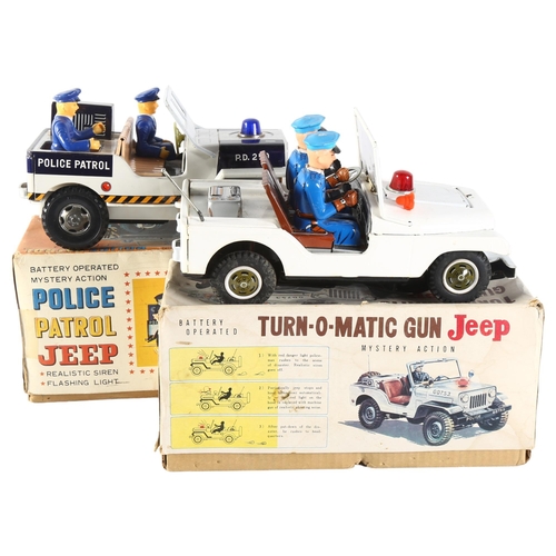 90 - A Vintage boxed tinplate battery operated Turn-O-Matic gun jeep, Mystery Action, in original box, po... 