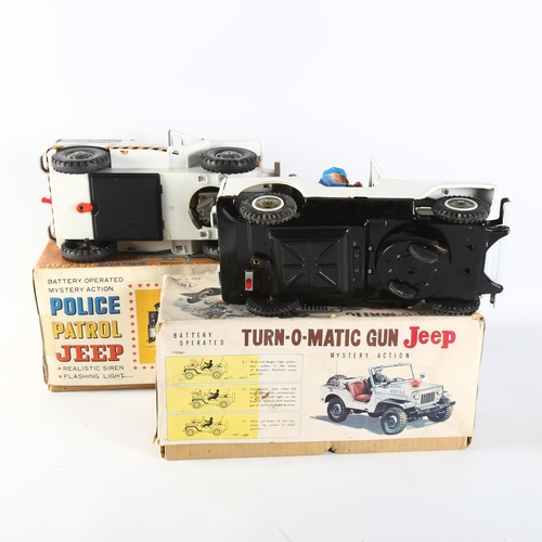 90 - A Vintage boxed tinplate battery operated Turn-O-Matic gun jeep, Mystery Action, in original box, po... 