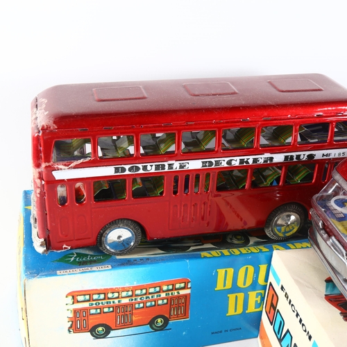 92 - A Vintage tinplate Friction Coach, MF184, in original box, and a Vintage Friction tinplate double-de... 