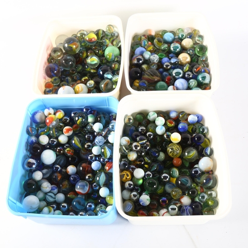 93 - A large quantity of Vintage marbles, 4 small plastic boxfuls