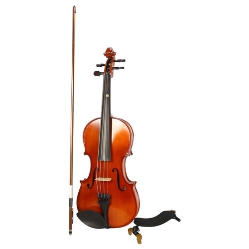 497 - A modern half-size violin, cased, L32cm