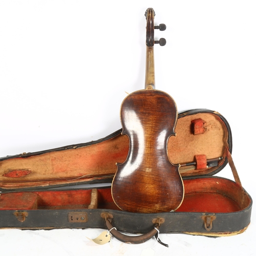 528 - A Victorian violin, with carved lionhead scroll, and horsehair bow, in hardshell case, violin is in ... 