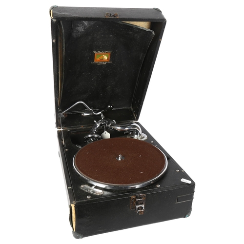 536 - HMV - a model 101 portable gramophone, in black carry case, with winding handle mechanism, length 41... 