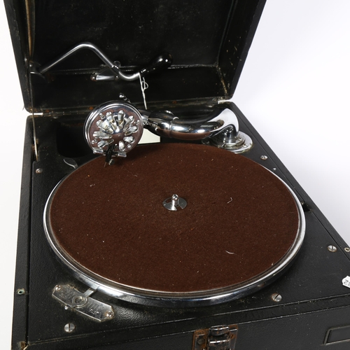 536 - HMV - a model 101 portable gramophone, in black carry case, with winding handle mechanism, length 41... 