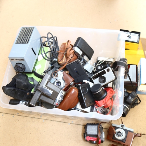 545 - A quantity of Vintage cameras and accessories, including a Kodak Instamatic 100 camera, a Fujifilm S... 