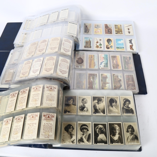 571 - 3 albums of cigarette cards, including Wills's Cigarettes Lucky Charms, Wills's Cigarettes Flowering... 