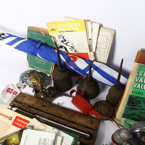 576 - A quantity of motoring and engineering ephemera and associated items, including several Vintage oil ... 