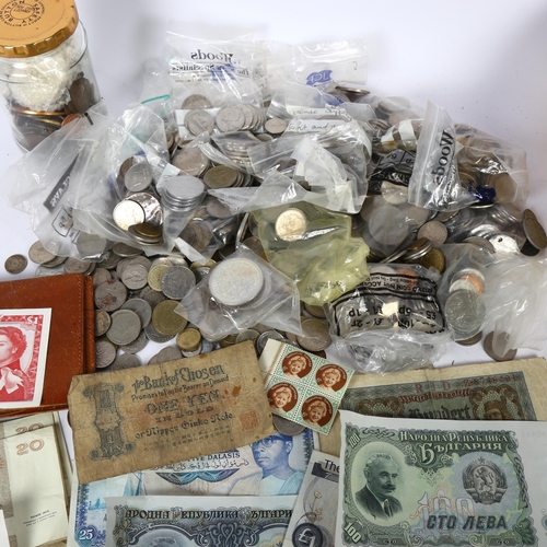 596 - A quantity of foreign coins, banknotes etc