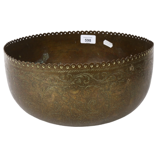 598 - A Tibetan engraved brass singing bowl with design of figures and foliage, and shaped pierced rim, 30... 