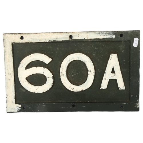 599 - A heavy painted cast-iron plaque 60A, 23cm x 38cm