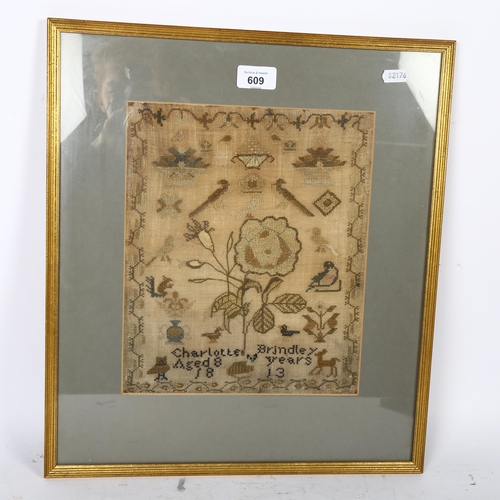 609 - A Regency Period cross-stitch sampler by Charlotte Brindley aged 8 years, 1813, with design of flowe... 