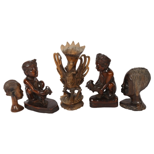 624 - A pair of Eastern carved wood cock-fighting figures, 16cm, 2 African heads, and another (5)