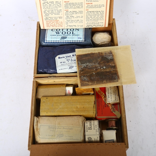 630 - Vintage Boots painted wood Home First Aid case, 18cm across, and contents