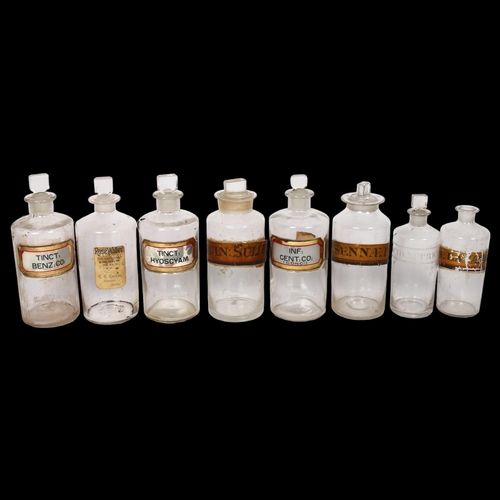 639 - A group of 8 Antique Chemist's bottles with 7 stoppers, 1 with etched Acid.Nitric.D label, the other... 