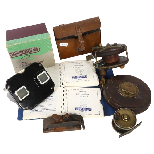 643 - 2 fishing reels, a small plane, Chesterman's tape, and a tin in leather carrying case