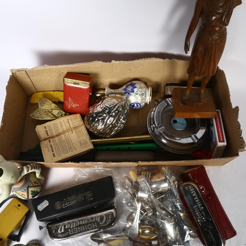 644 - A box of interesting items, including harmonicas, whistles, fly ashtray, egg timer, cutlery etc