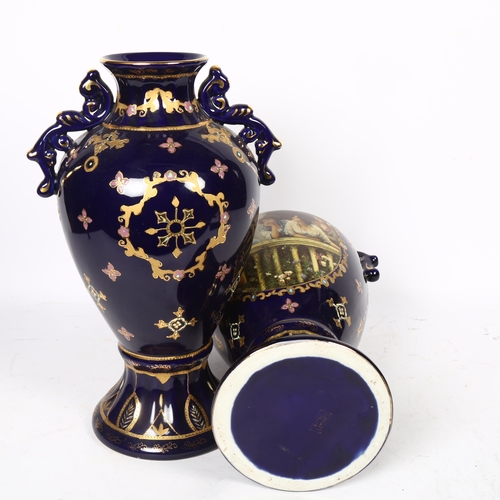 653 - A pair of Royal Limoges cobalt blue 2-handled baluster vases with portrait panels, H35cm