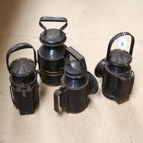 665 - 4 various early black painted metal lanterns, 2 with lenses, tallest 32cm