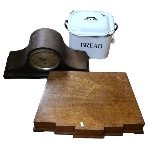 678 - A Napoleon hat clock (glass cracked), an Art Deco oak canteen box and contents, and an enamel bread ... 