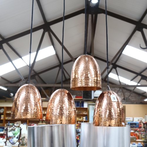 686 - A set of 4 hammered copper ceiling pendant lights, shade height 19cm