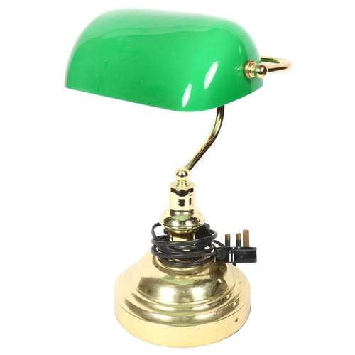 692 - An adjustable brass desk lamp, with green glass shade, height 38cm