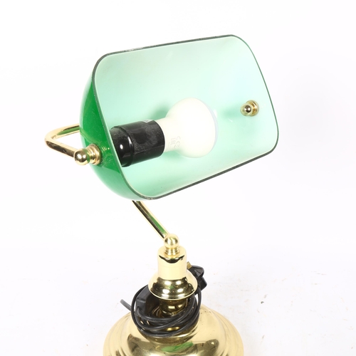 692 - An adjustable brass desk lamp, with green glass shade, height 38cm