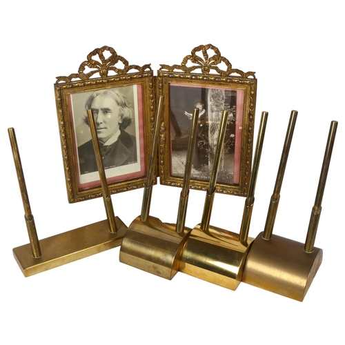 703 - 4 brass pen stands, and a gilt-brass hinged double photograph frame with ribbon pediments, height 20... 